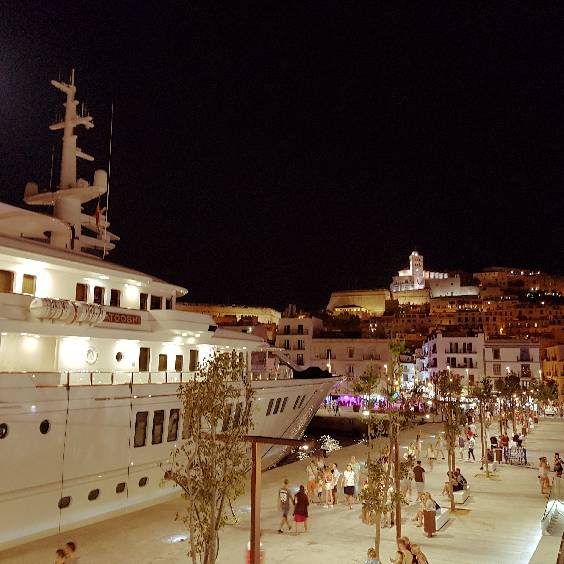 Luxurious Yachts Against the Backdrop of Ibiza’s Scenic Old Town